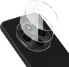 A close-up shot of a smartphone's rear camera module with two clear glass lens protectors placed over it. Produktbild-Vorschau