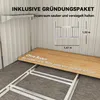 Interior view of a shed or storage unit, showing a foundation kit and a wooden board placed on it. Produktbild-Vorschau