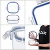 Collage of images showing a glass food storage container with a blue lid, demonstrating its features and size. Anteprima dell’immagine prodotto