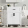 A white bathroom vanity with a black faucet and black handles, set against a tiled wall and a checkered floor. Podgląd zdjęcia produktu