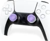 A white and black video game controller with purple joystick covers. Anteprima dell’immagine prodotto