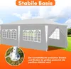 A gray gazebo with white windows is set up on a grassy area with a blue sky and clouds in the background. A close-up of the gazebo's base is shown in the lower left corner. Produktbild-Vorschau