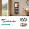 A modern bathroom with a dark grey towel radiator mounted on the wall, a large window with a view of trees, and a sink area with toiletries. Náhľad obrázku produktu