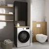 A modern laundry room with a washing machine, cabinets, and a wall-mounted toilet. Anteprima dell’immagine prodotto