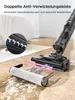 A wet dry vacuum cleaner with a detachable roller brush is shown on a tiled floor with water and foam. Produktbild-Vorschau