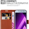 A brown wallet-style phone case with cards and money inserted, next to a Samsung smartphone. Podgląd zdjęcia produktu