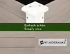 Close-up of a white wooden post on a light gray wooden surface, with green overlay text and a brand logo at the bottom. Produktbild-Vorschau