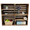 Four wooden crates stacked in a 2x2 grid, each with shelves, displaying various decorative and functional items. Náhled obrázku produktu