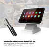 A touchscreen stylus and tablet stand are displayed against a collage of blurred images of people using tablets. Podgląd zdjęcia produktu