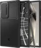 A black phone case with a sliding camera cover is shown next to a smartphone and stylus. Podgląd zdjęcia produktu