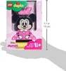 A LEGO DUPLO Minnie Mouse toy in its packaging, held by a hand. Anteprima dell’immagine prodotto