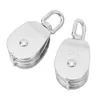 Two stainless steel pulleys on a white background. Voir les images du produit