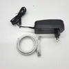 A power adapter and an Ethernet cable are laid out on a white background. Anteprima dell’immagine prodotto