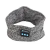 A grey fabric headband with a small control panel on the front. Náhľad obrázku produktu