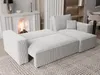 A light gray sectional sofa with a pull-out bed function is displayed in a living room setting, with a fireplace in the background. Produktbild-Vorschau