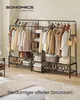 A well-organized open wardrobe with clothes and shoes displayed on shelves and hanging rods. Produktbild-Vorschau