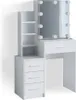 A white vanity table with a lighted mirror and storage drawers and shelves.