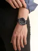A close-up shot of a man's wrist wearing a Casio Edifice Bluetooth watch. Produktbild-Vorschau