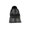 The back view of a black Adidas shoe. Náhled obrázku produktu