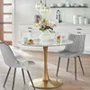 A dining set with a marble-top table and two chairs in a kitchen setting. Produktbild-Vorschau