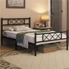 A bedroom scene with a metal bed frame. Podgląd zdjęcia produktu