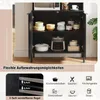 Interior view of a black kitchen cabinet with various kitchen items and a text overlay. Náhled obrázku produktu