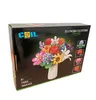 The image shows the front of a product box for a building block set. The box features a picture of a flower bouquet made from the blocks, along with branding and product details. Náhľad obrázku produktu