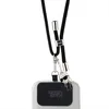 A black cord with silver accents and a Karl Lagerfeld charm hangs from a phone case. Anteprima dell’immagine prodotto