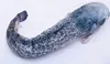 A stuffed toy catfish on a white background. Produktbild-Vorschau