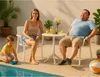 A family enjoying a sunny day by the pool, with a small round table set up on the patio. Náhľad obrázku produktu