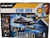 The image shows the front of a Playmobil Star Trek U.S.S. Enterprise playset box. The box features an illustration of the starship, characters from the original series, and branding. Podgląd zdjęcia produktu