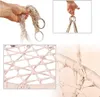 Collage of images showing details of a hanging chair, including the rope structure, attachment rings, and a hand holding the rope. Produktbild-Vorschau