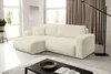 A modern living room with a large, beige corduroy sectional sofa. Produktbild-Vorschau