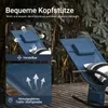 A blue lounge chair with a pillow and blanket on a wooden deck, surrounded by foliage. Produktbild-Vorschau