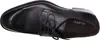 A top-down view of a black leather shoe. Produktbild-Vorschau