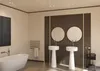 A modern bathroom with a freestanding bathtub, two pedestal sinks, and a heated towel rack. Anteprima dell’immagine prodotto