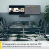A modern conference room with a table, chairs, and a video conferencing system mounted on the wall. Anteprima dell’immagine prodotto