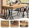 A bar table and stools on a balcony with a view of houses. Voir les images du produit