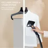 A split image showing a garment steamer in use on a white shirt on the right, and a close-up of the steamer's ironing board attachment on the left. Produktbild-Vorschau
