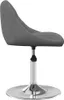 A side view of a dark gray velvet swivel chair with a chrome base. Produktbild-Vorschau