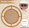 The back of a round mirror with rattan detailing, showing installation hardware. Podgląd zdjęcia produktu