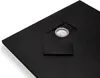 A close-up view of a black shower tray with a built-in light and a small rectangular cover. Produktbild-Vorschau