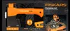 A collage of images showing a Fiskars camping set, including an axe, knife, and saw, with a campfire in the background. Produktbild-Vorschau
