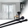 A double curtain rod is shown in the foreground, with a window and curtains in the background. Anteprima dell’immagine prodotto