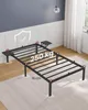 A metal bed frame is shown in a room with wood paneled walls and a window with white curtains. Náhled obrázku produktu