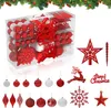 A collection of red and white Christmas ornaments arranged in a clear plastic box and displayed separately. Náhľad obrázku produktu