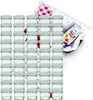 A large set of glass jars with white lids, arranged in rows, with a recipe booklet and a checkered cloth in the background. Produktbild-Vorschau