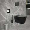 A modern bathroom with a wall-mounted toilet, toilet paper holder, toilet brush, and trash can against a marble-patterned wall. Podgląd zdjęcia produktu