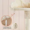 A close-up view of a cat tree accessory, showing a dangling toy ball and a detailed inset of its attachment mechanism. Produktbild-Vorschau
