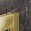 Detailbild eines Wandanschlussprofils einer Dusche in Goldoptik Produktbild-Vorschau